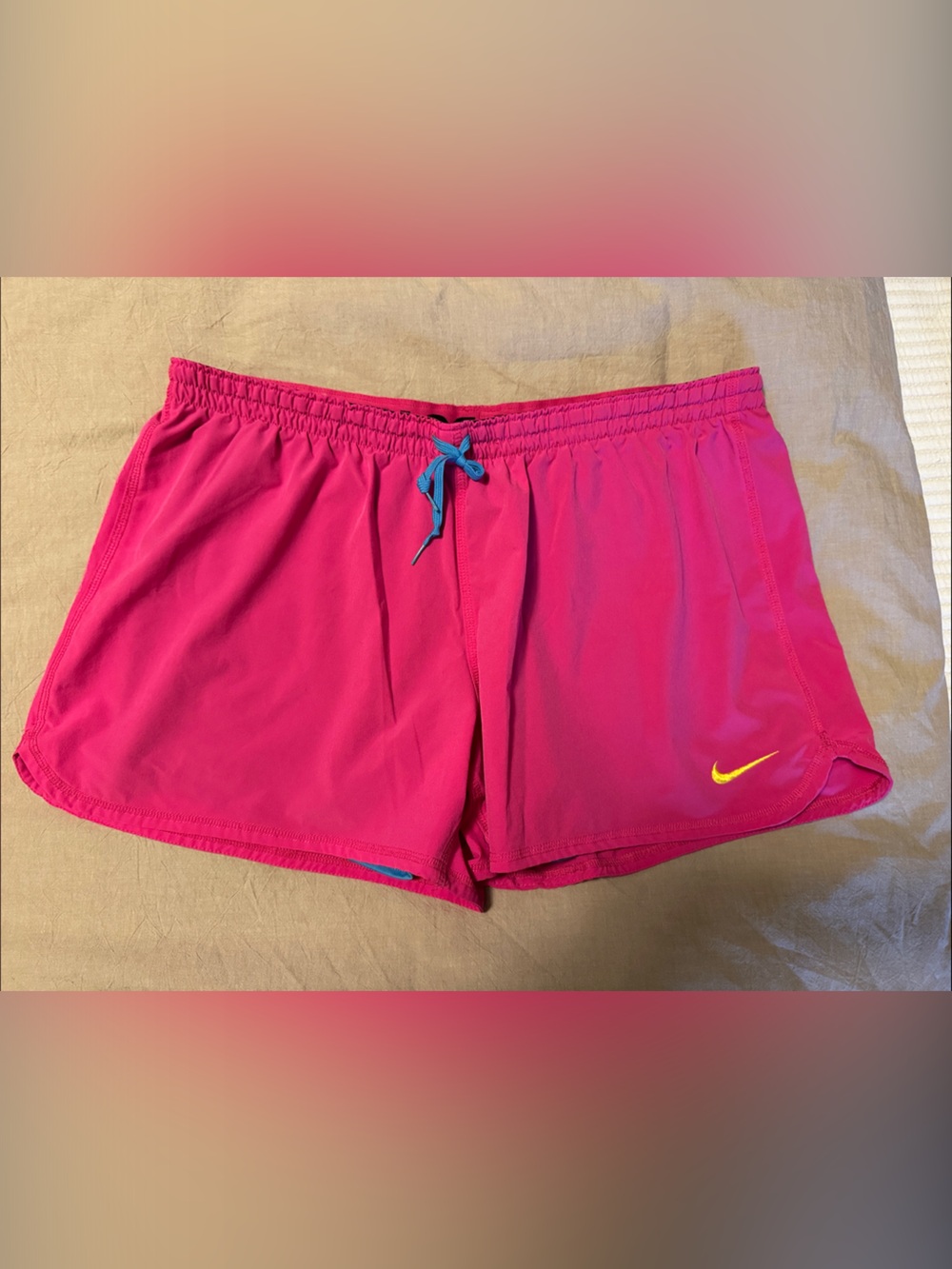 Nike Women’s Hot Pink Athletic Shorts with spandex shorts